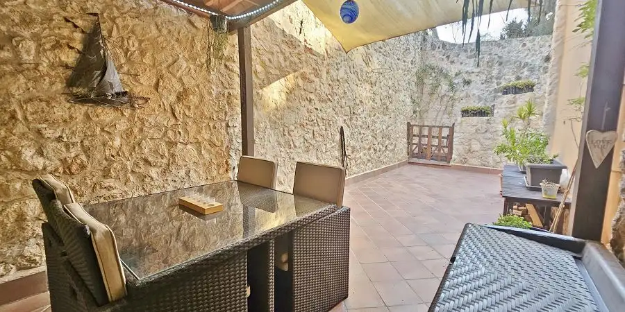 Semi-detached three bedroom town house with garage in Cala Figuera 